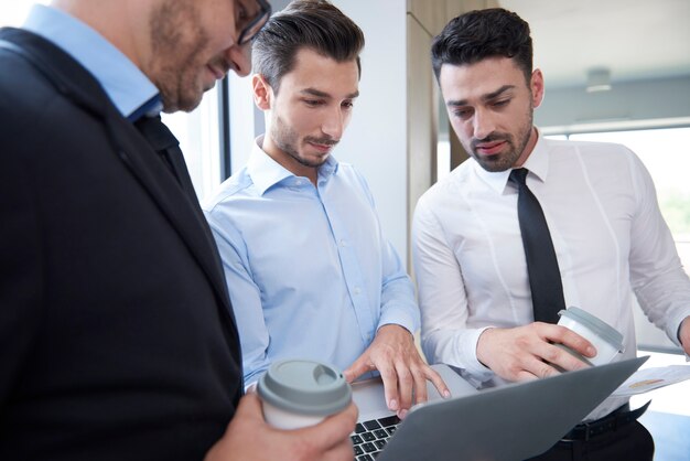 Close up on people working in the office