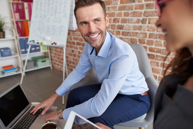 Close up on people working in the office