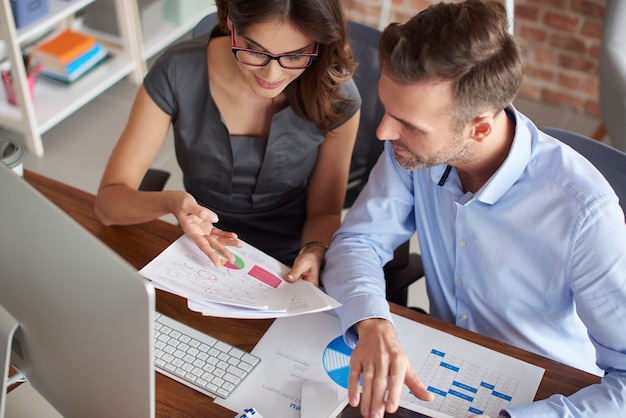 Close up on people working in the office