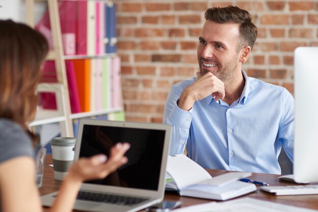 Close up on people working in the office