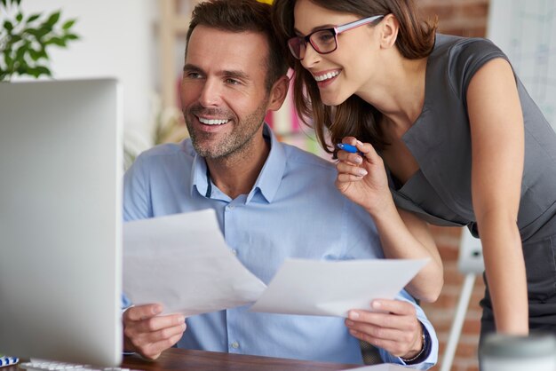 Close up on people working in the office