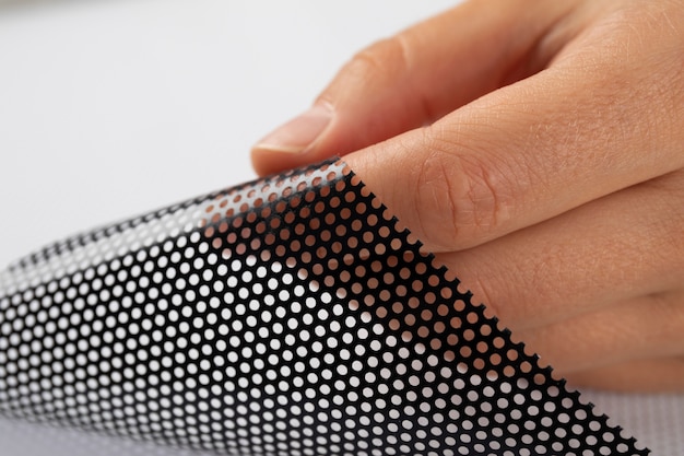 Close up on perforated fabric