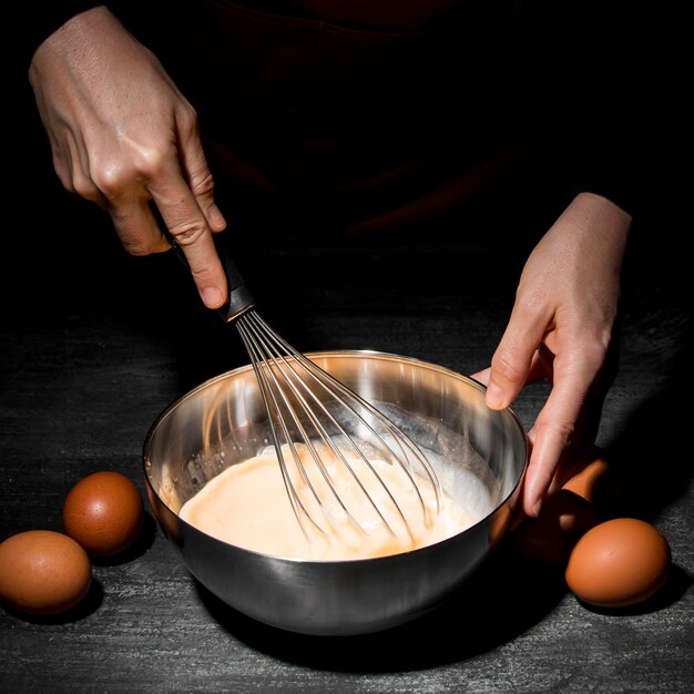 Close-up person cooking