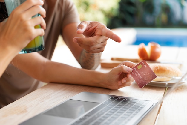 Close up on person doing online shopping