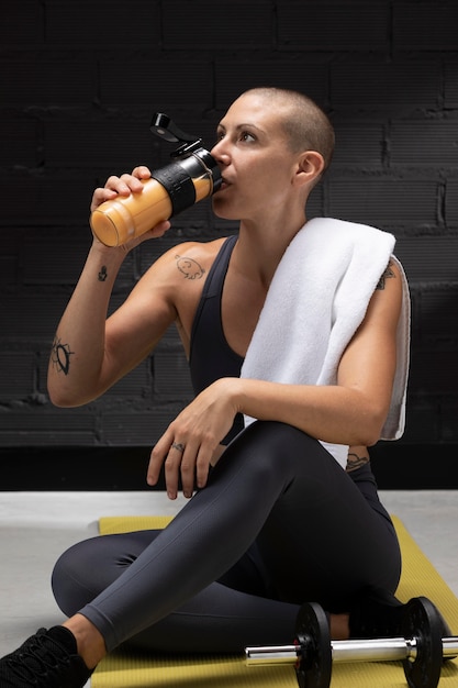 Close up on person drinking juice of food complements