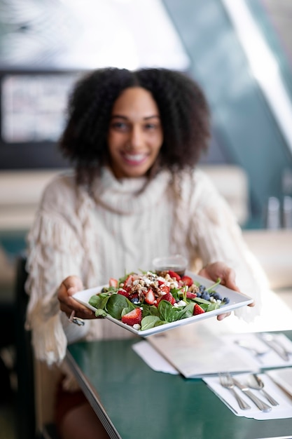 Free photo close up on person enjoying food