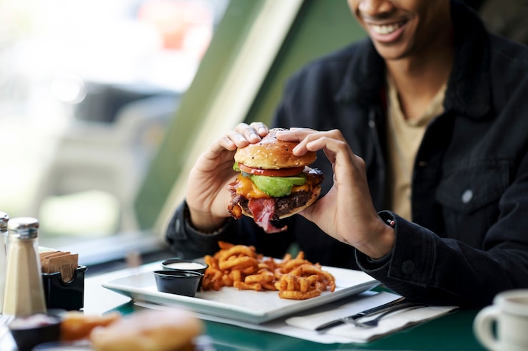 Free Photo close up on person enjoying food