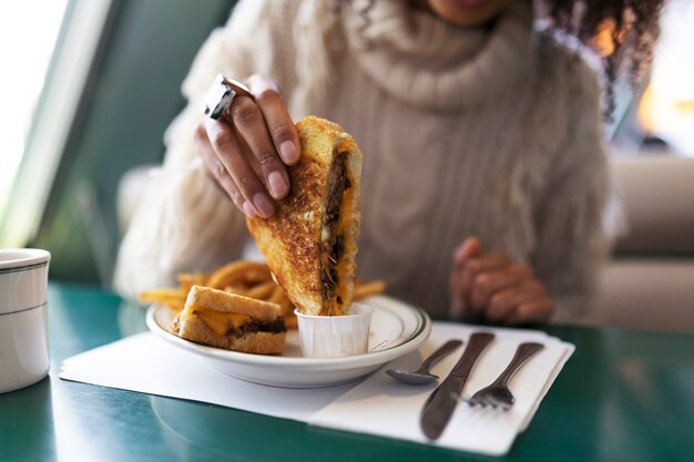 Close up on person enjoying food