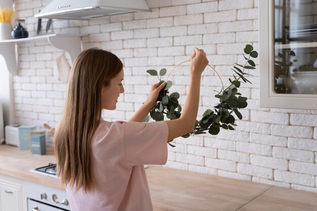 Close up on person making home comfortable