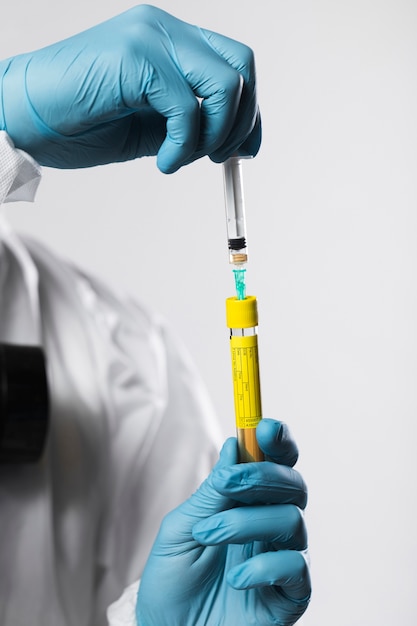 Close-up person preparing medical treatment