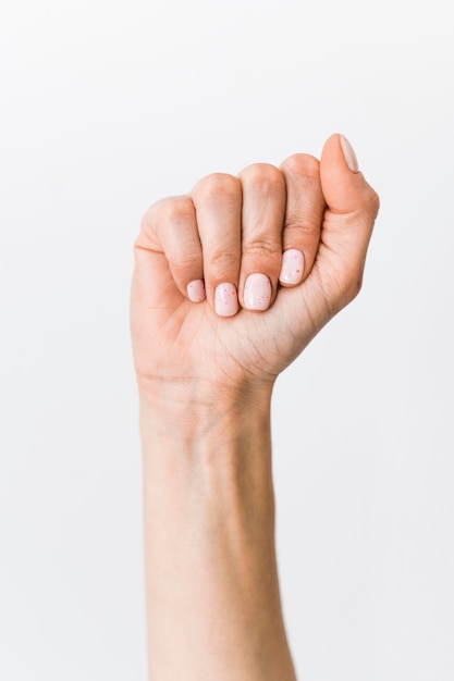 Free photo close-up person teaching sign language