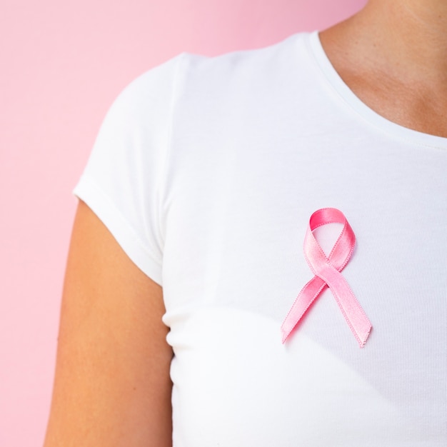 Close-up person with awareness ribbon 