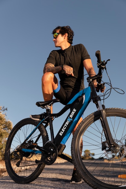 Close up on person with electric bike