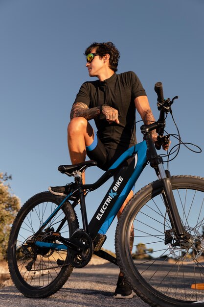 Close up on person with electric bike