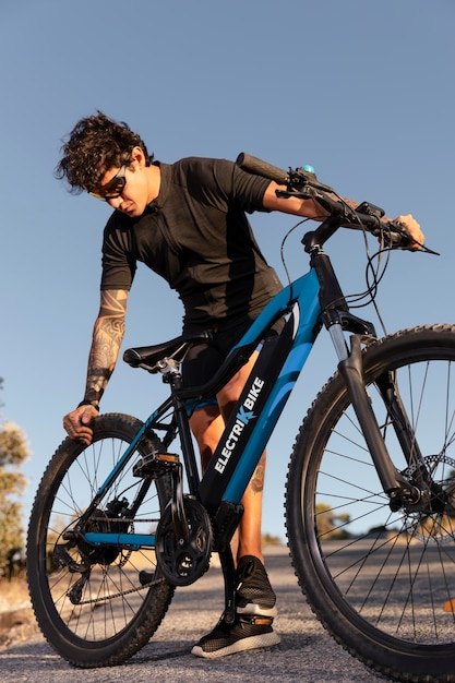 close up on person with electric bike