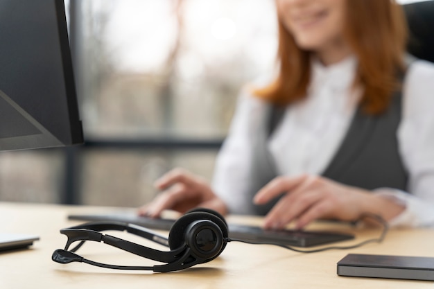 Close up on person working in call center