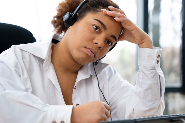 Close up on person working in call center