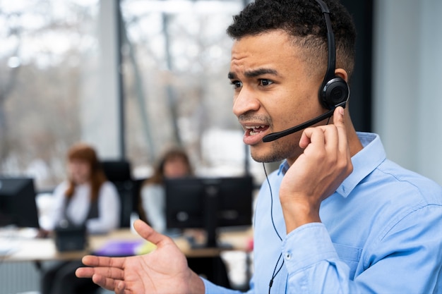 Close up on person working in call center