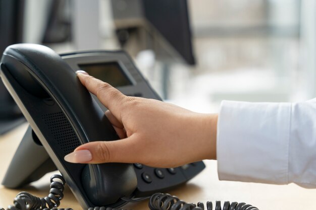 Close up on person working in call center