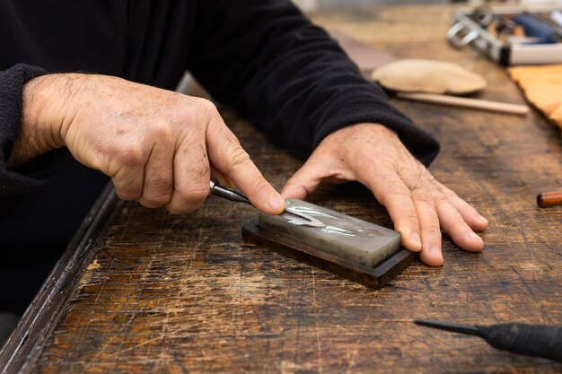 Close up on person working on engraving