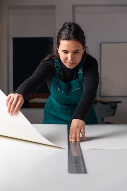 Close up on person working on engraving