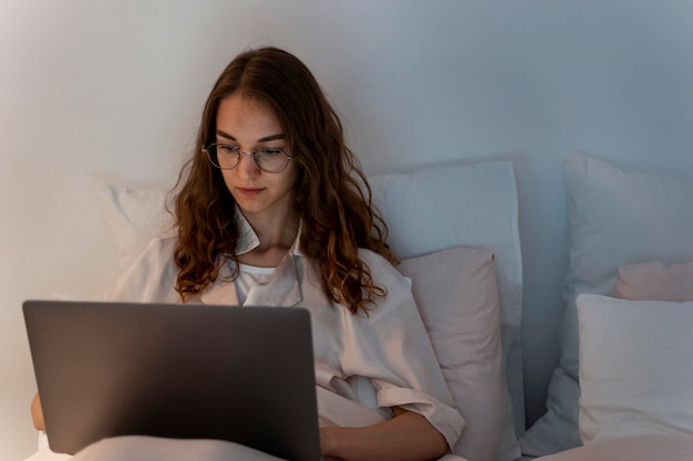 Free photo close up on person working at home at night