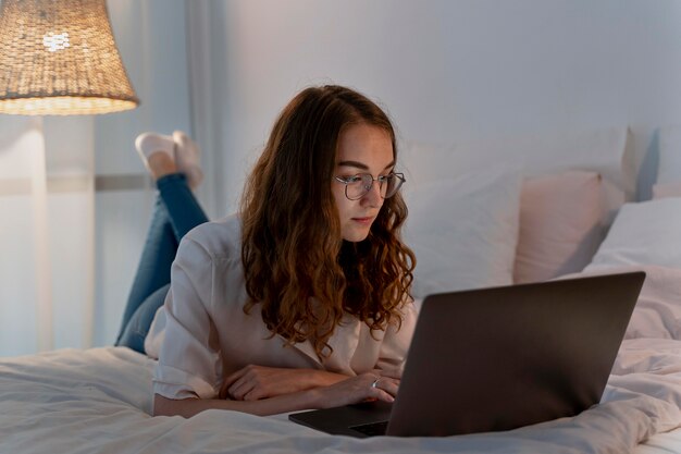 Close up on person working at home at night