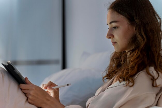 Close up on person working at home at night