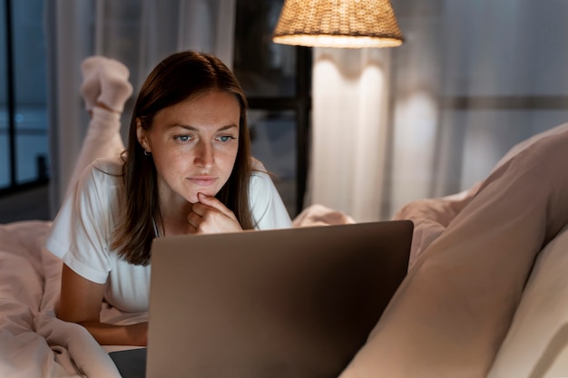 Free photo close up on person working at home at night