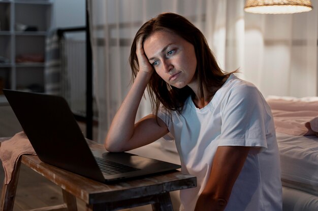 Close up on person working at home at night