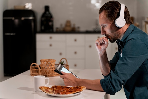 Free photo close up on person working at home at night