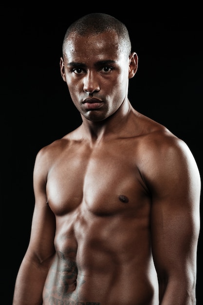 Close-up photo of afroamerican boxer resting after fight