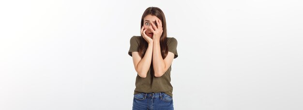 Close up photo beautiful lady arms hands raised hiding amazed full fear eyes facial expression scary