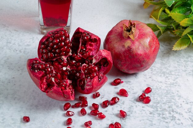 Close up photo of fresh sliced pomegranate sliced or whole. 