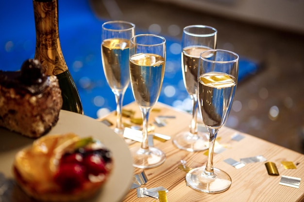 Close up photo of glasses with champagne