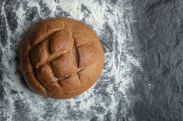 Close up photo of rye bread. on flour.