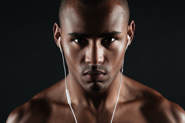 Close-up photo of serious afro american young man