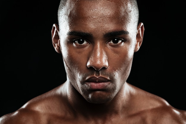 Close-up photo of young afro american tired athlete