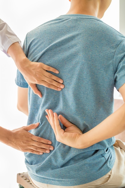 Free photo close up of physiotherapist working with patient in clinic