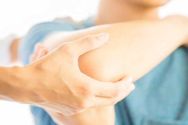 Close up of Physiotherapist working with patient in clinic