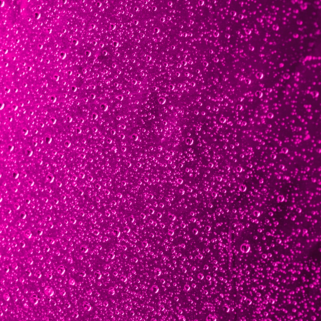 Close-up of pink abstract water drops background