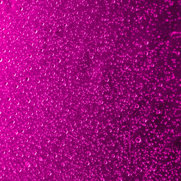 Close-up of pink abstract water drops background