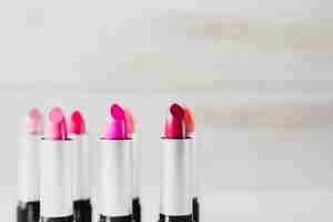 Free photo close-up pink lipsticks