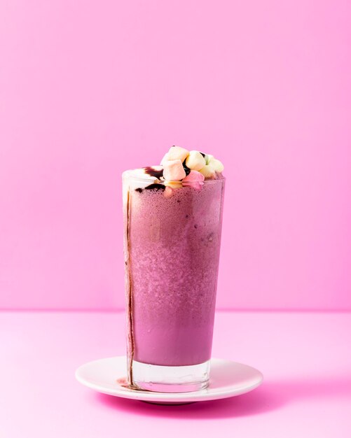 Close-up pink milkshake