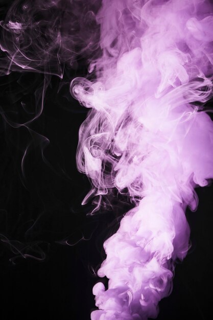 Close-up of pink smoke overlay texture on the black background