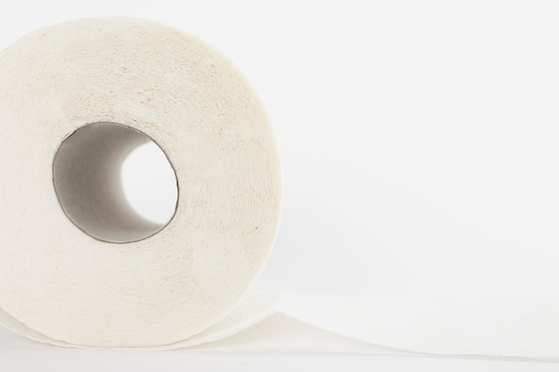 Free photo close-up plain toilet paper roll