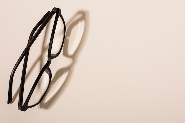 Close-up plastic eyeglasses with shadow