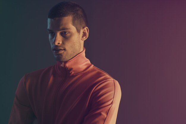 close-up portrait of attractive male model. Color flash  light