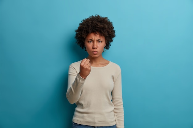 Close up portrait of an attractive young woman isolated