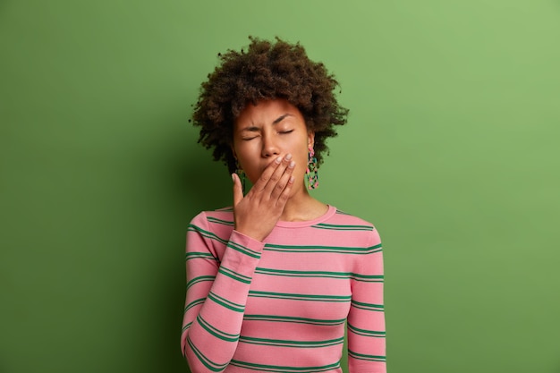 Close up portrait of an attractive young woman isolated